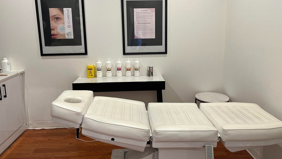 Treatment room at The Aesthetics Collective Maitland in South Maitland, New South Wales, AU, featuring a white massage chair.