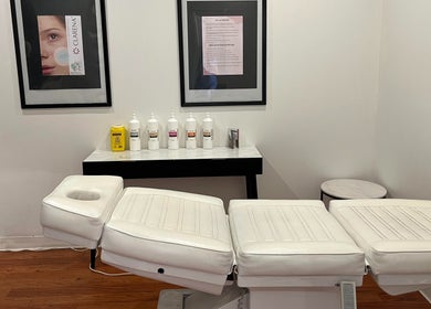 Treatment room at The Aesthetics Collective Maitland in South Maitland, New South Wales, AU, featuring a white massage chair.