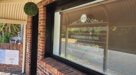 Window of The Aesthetics Collective Maitland, South Maitland, New South Wales, AU featuring bold signage.