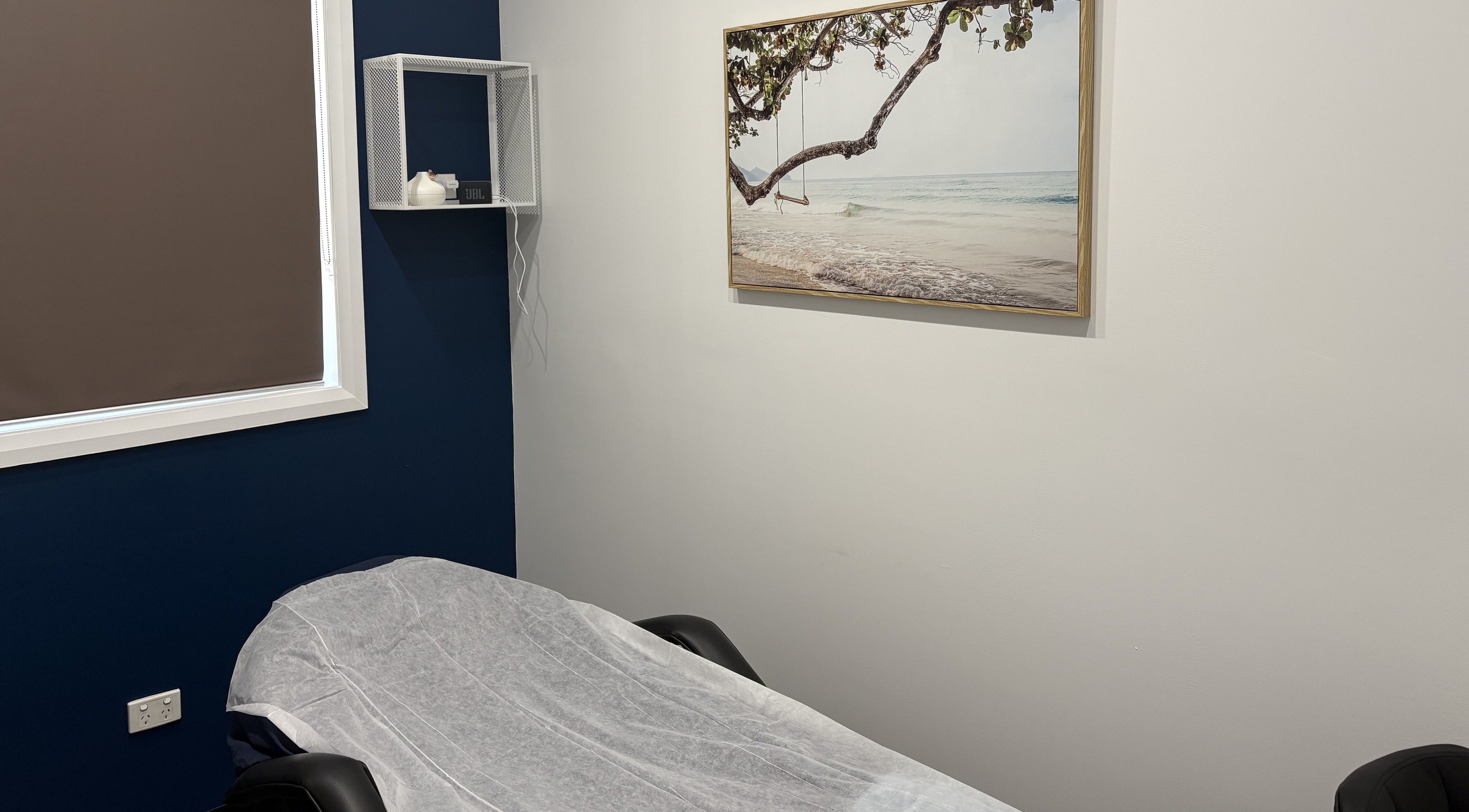 Oh My Skin - Maitland's serene treatment room in South Maitland, New South Wales, AU with coastal artwork.