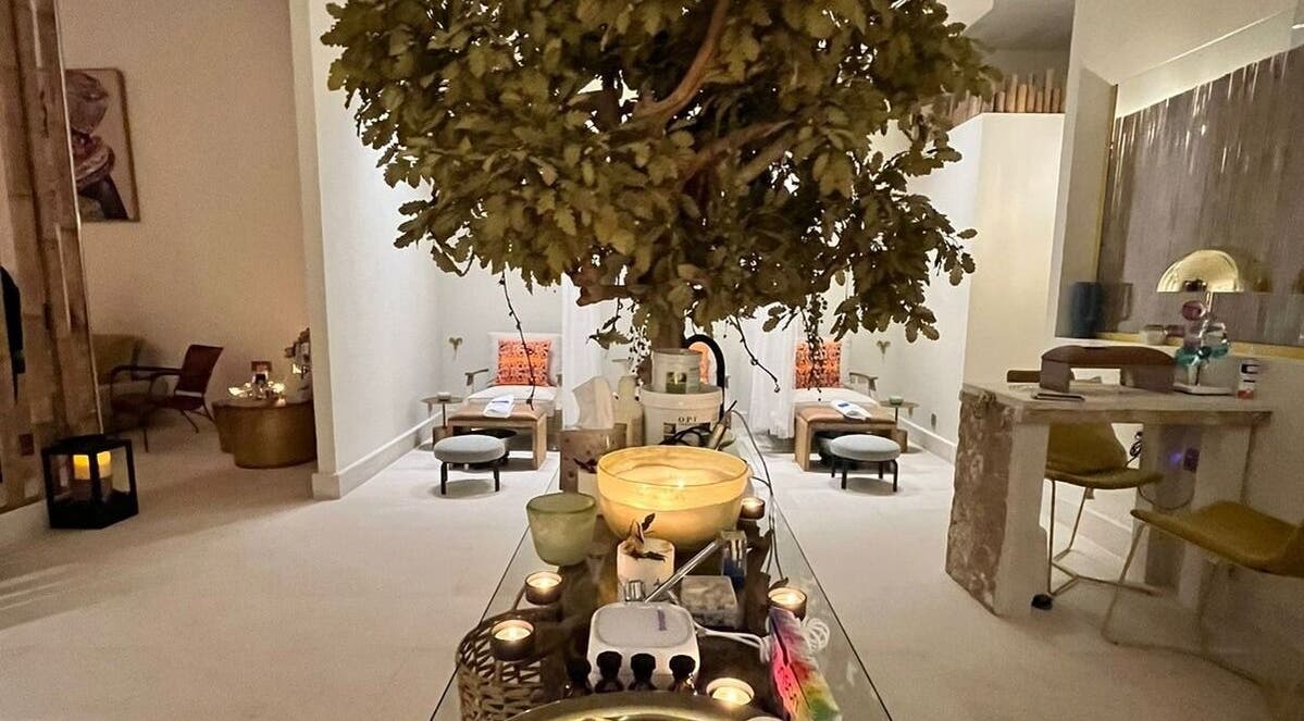 Relaxing interior at La Femme Salon & Nail Spa, Al Khobar, Eastern Province, SA, showcasing spa seating and candles.