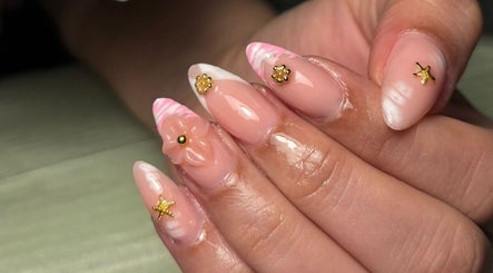 Elegant nail art with floral designs at La Femme Salon & Nail Spa, Al Khobar, Eastern Province, SA.