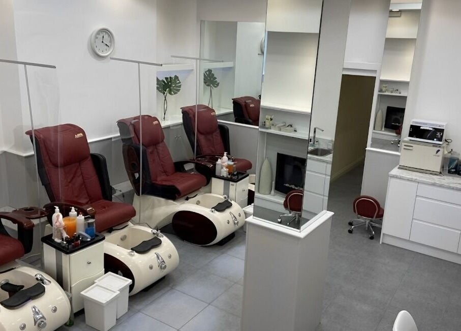 Luxury pedicure chairs at Totally Tips and Toes, London, England, GB, offering comfort and relaxation.