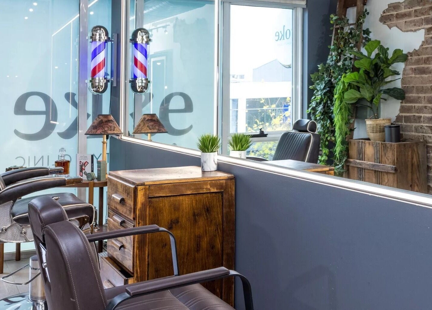 Modern barber chairs and stylish decor at Evoke Hair Salon Rosebery, Rosebery, New South Wales, AU.