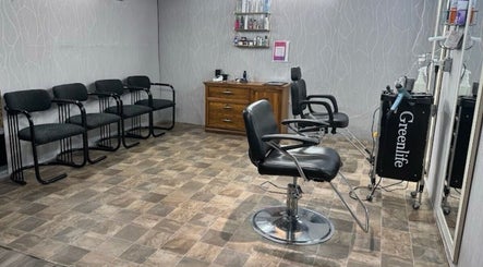 Interior of Shiren Hair & Beauty, Regina, Saskatchewan, CA with stylish chairs and beauty products.