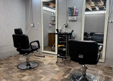 Modern hair salon at Shiren Hair & Beauty in Regina, Saskatchewan, CA with sleek styling chairs and mirrors.