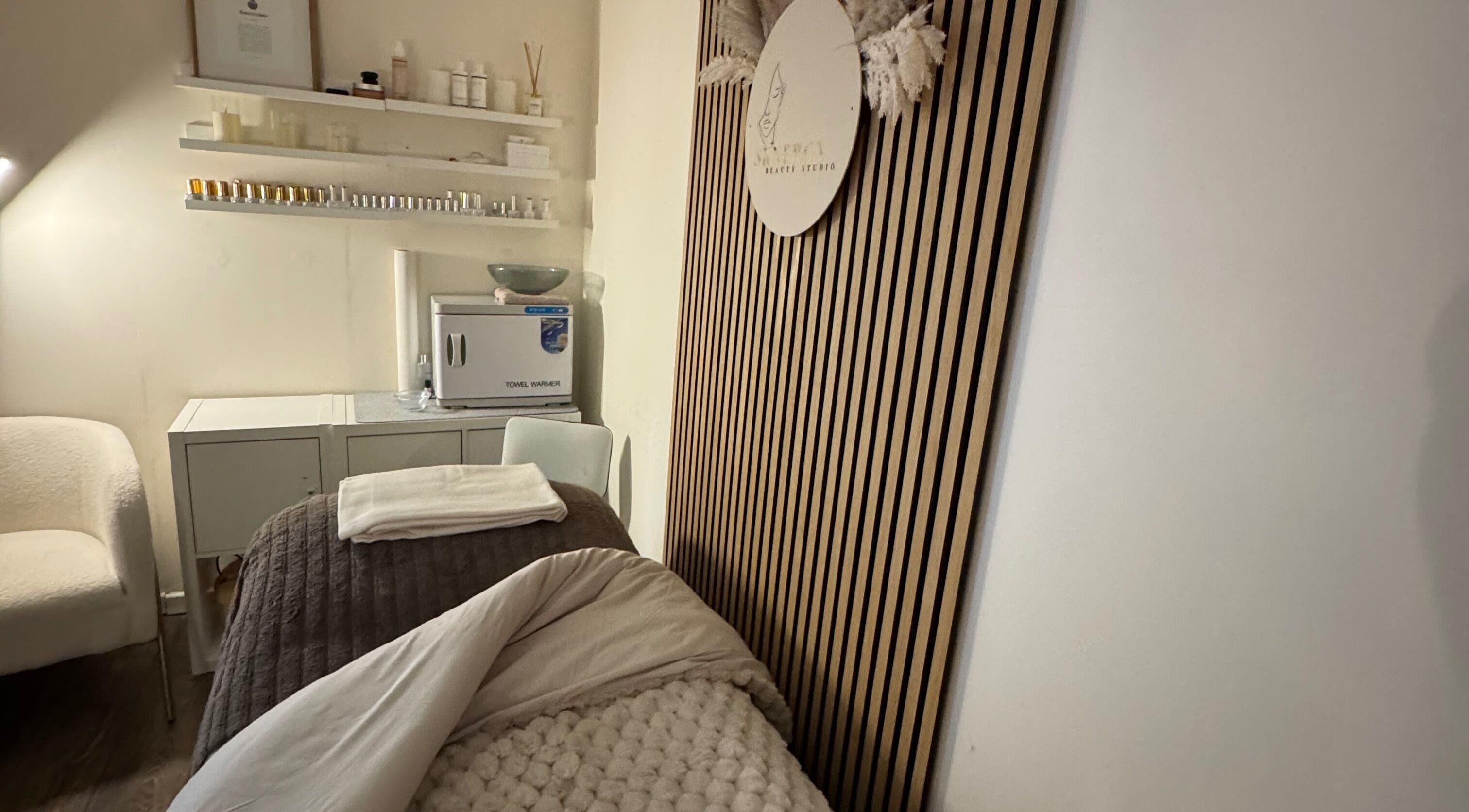 Peaceful treatment room at Sknergy Beauty Studio, Owlsmoor, England, GB. Perfect for ultimate relaxation.