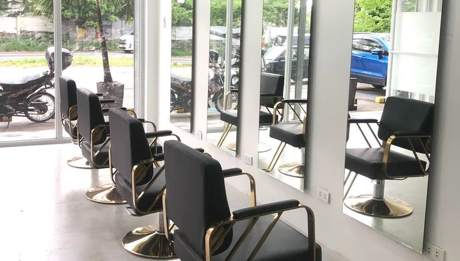 Modern salon chairs at CJ Hair Lounge, Angeles, Central Luzon, PH, reflecting a sleek, contemporary design.
