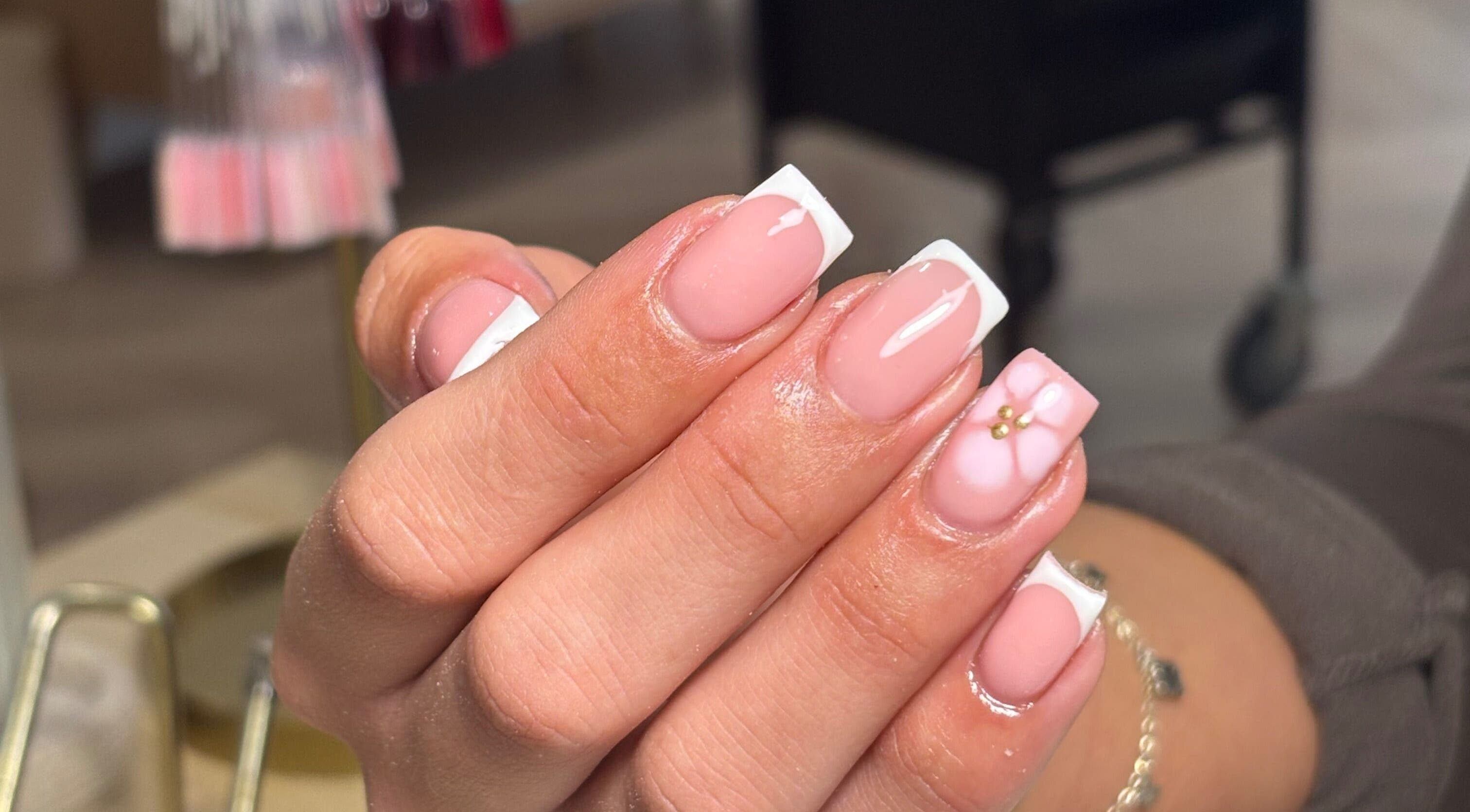 French manicure with floral design at Nail Babe By Sophie, Nottingham, England, GB.