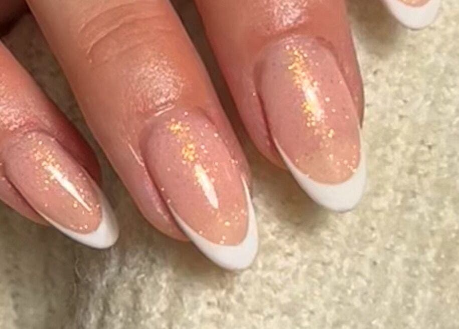 Elegant glitter French manicure by Nail Babe By Sophie, Nottingham, England, GB. Perfect glossy finish.