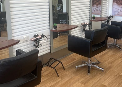 Stylish salon chairs and mirrors at Kut Loose Hairdesign Robe, Robe, South Australia, AU.