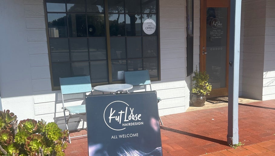 Front view of Kut Loose Hairdesign Robe, a stylish salon in Robe, South Australia, AU with welcoming signage.