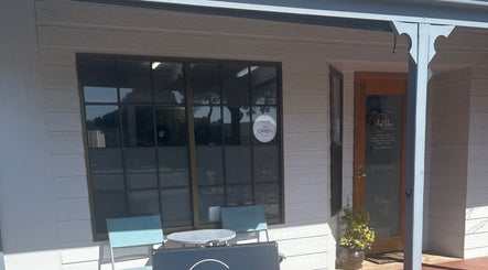 Front entrance of Kut Loose Hairdesign Robe, a chic salon in Robe, South Australia, AU.
