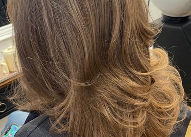 Stylish hair with waves at Miles Rhodes Hair Stylist, Bath, England, GB.