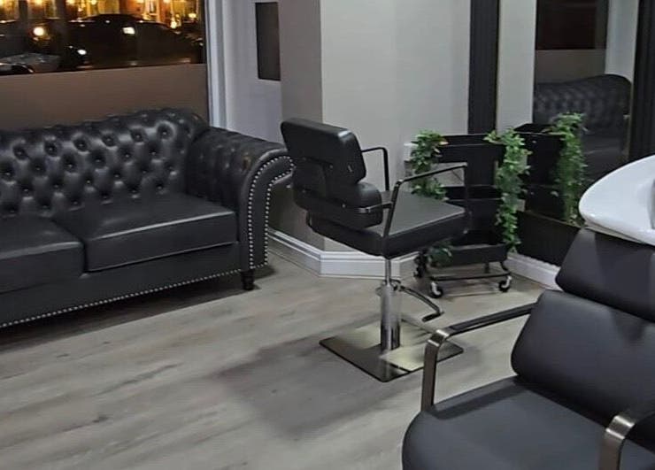 Modern salon interior at Professional Enhancements, Lytham St Annes, England, GB with sleek furniture and decor.