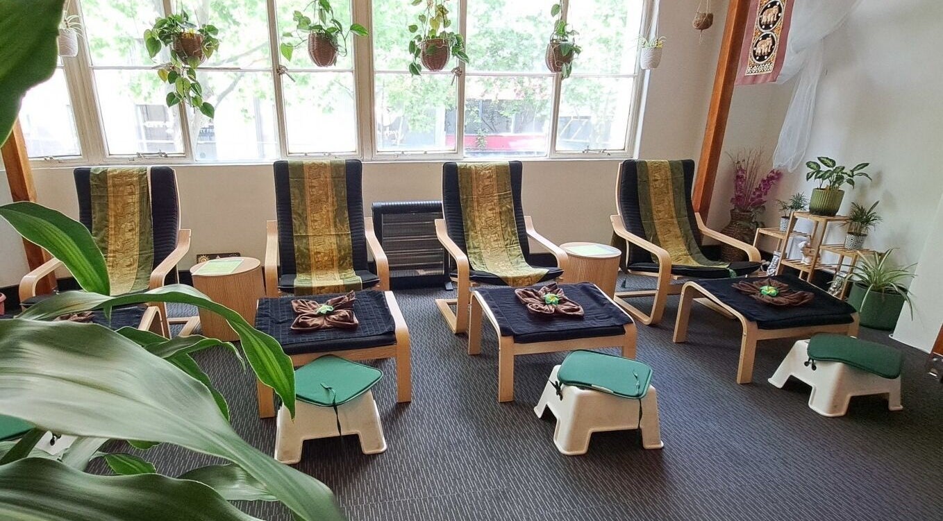 Relaxation chairs at Acacia Thai Massage, Melbourne, Victoria, AU, offering a peaceful ambiance with lush greenery.