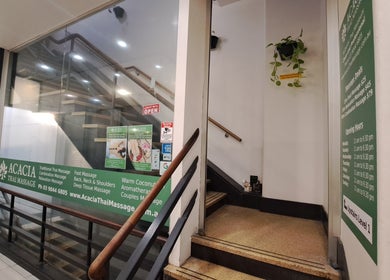 Entrance to Acacia Thai Massage in Melbourne, Victoria, AU showing signs and stairs.