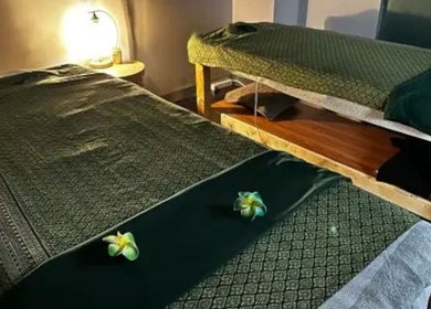 Peaceful treatment room at Elegant Thai Massage, Melbourne, Australia, AU with cozy, adorned spa beds.