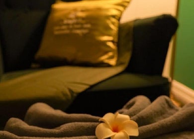 Cozy massage chair with plush cushions at Elegant Thai Massage, Hair Spa and Foot Spa in Melbourne, Victoria, AU.