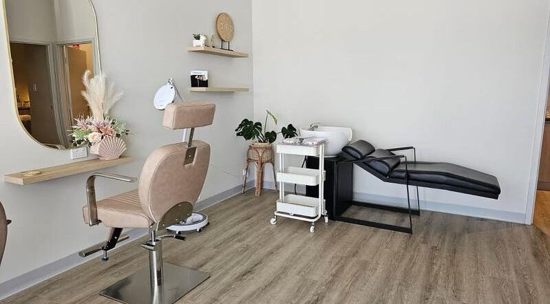Modern therapy room at Aria Beauty & Spa, Harrisdale, Western Australia, AU with elegant decor and styling chair.