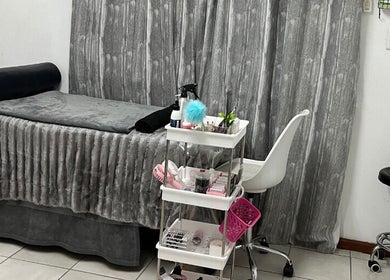 Sleek beauty treatment room at Get It Bae Cpt, Cape Town, Western Cape, ZA featuring cozy decor.