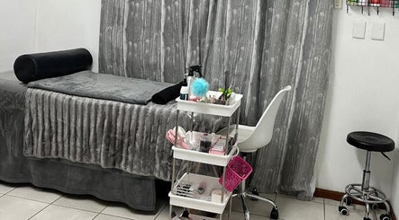 Sleek beauty treatment room at Get It Bae Cpt, Cape Town, Western Cape, ZA featuring cozy decor.