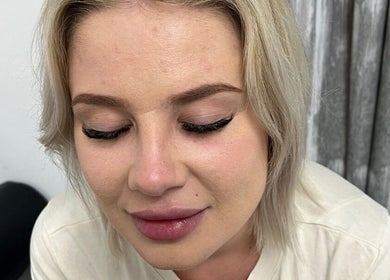 Close-up of a woman with professional makeup at Get It Bae Cpt in Cape Town, Western Cape, ZA.