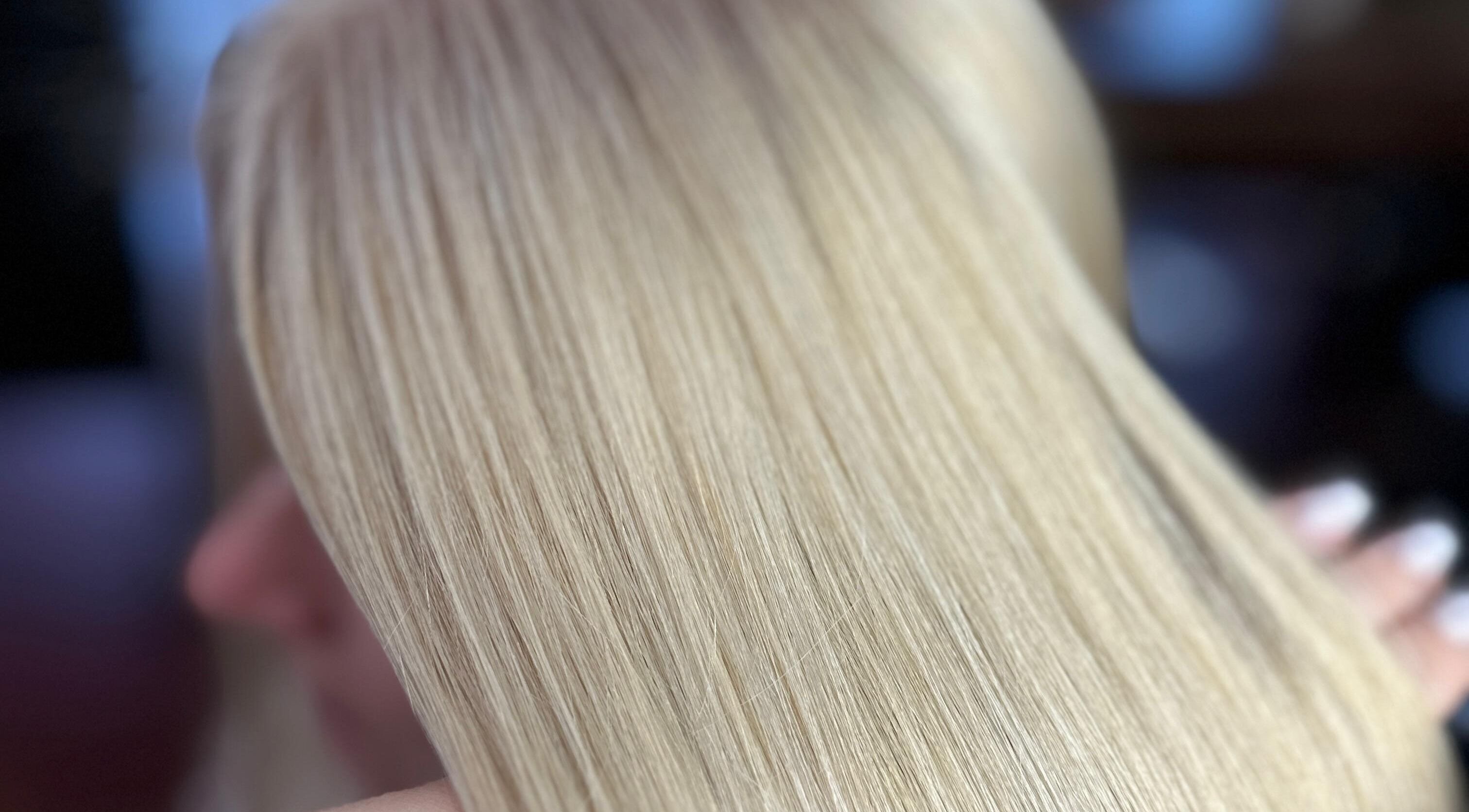 Sleek blonde hair styled at Luxury Beauty By Barsha, Rockdale, New South Wales, AU for a radiant look.