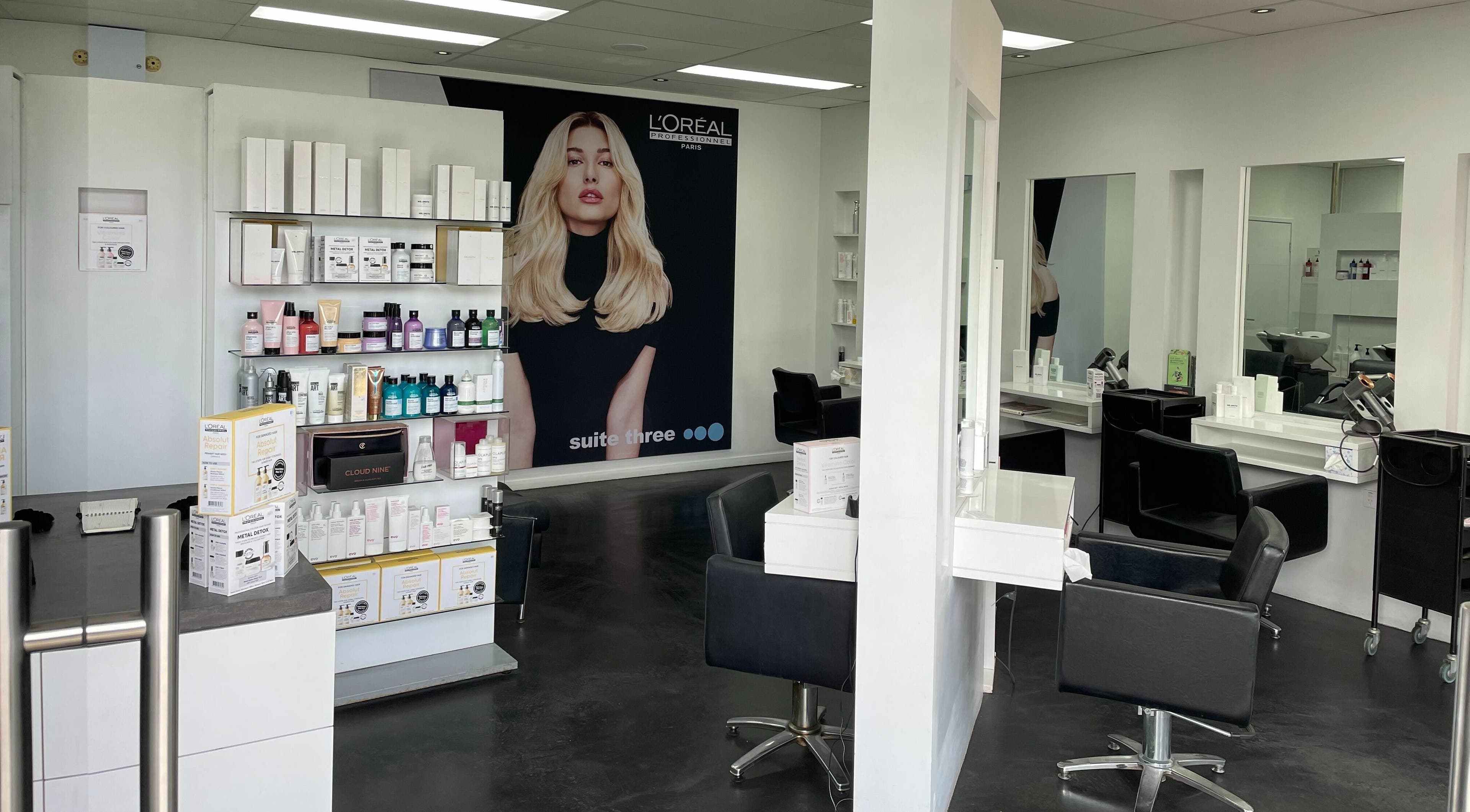 Suite Three salon interior showcasing products and styling chairs in Buderim, Queensland, AU.