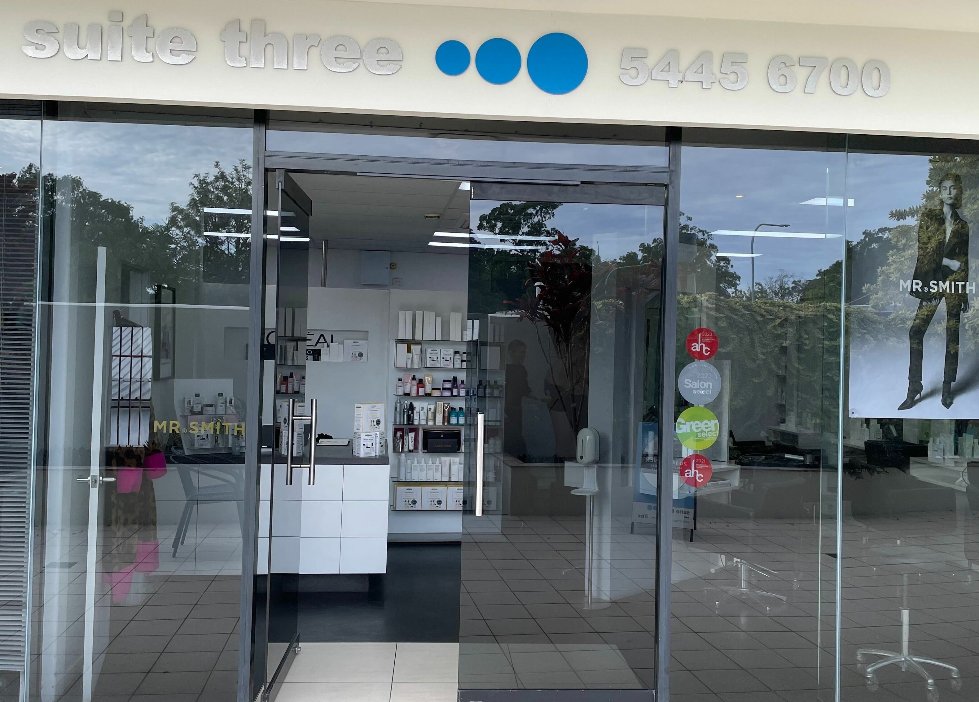 Front view of Suite Three salon, Buderim, Queensland, AU showcasing modern glass entrance and signage.
