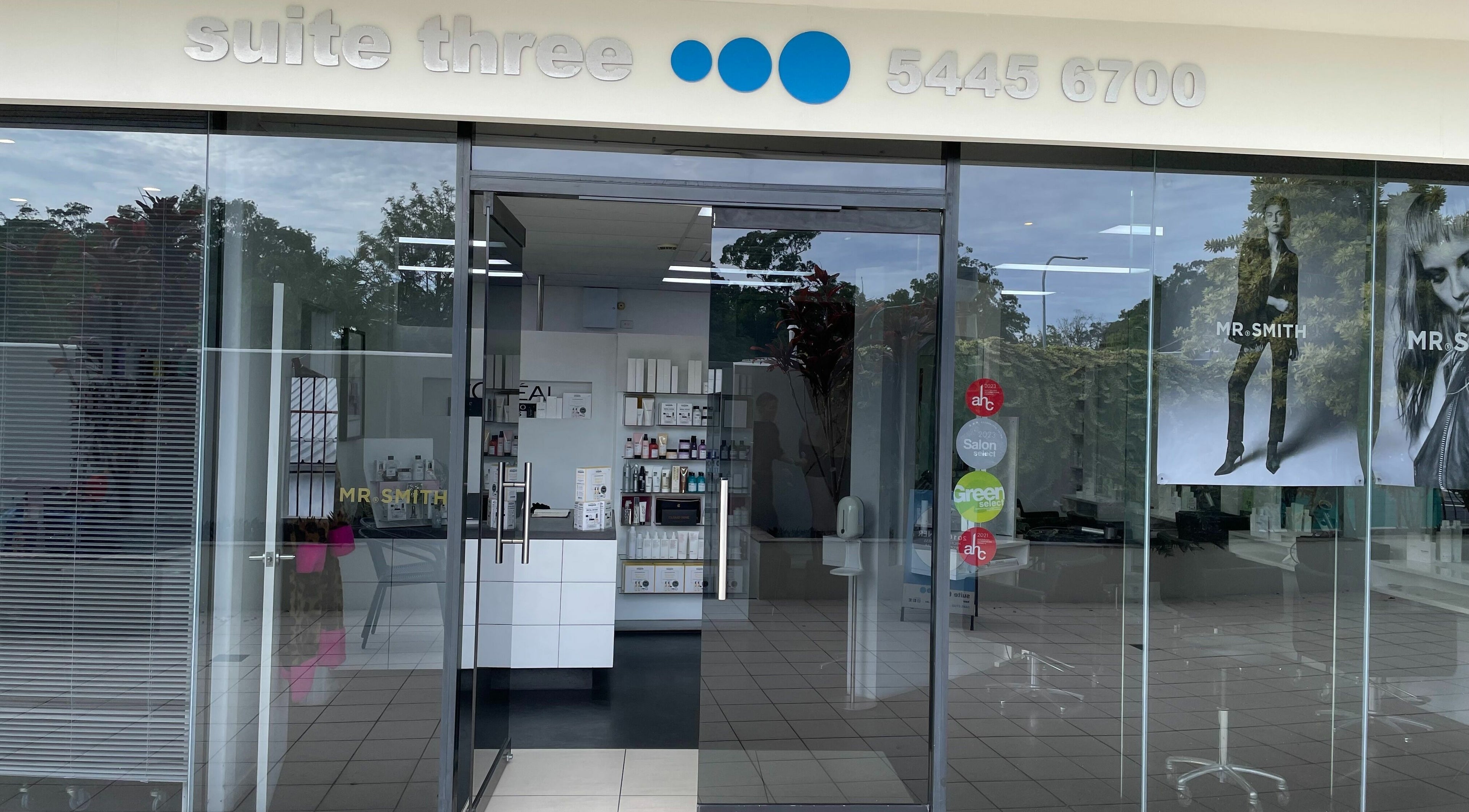 Front view of Suite Three salon, Buderim, Queensland, AU showcasing modern glass entrance and signage.