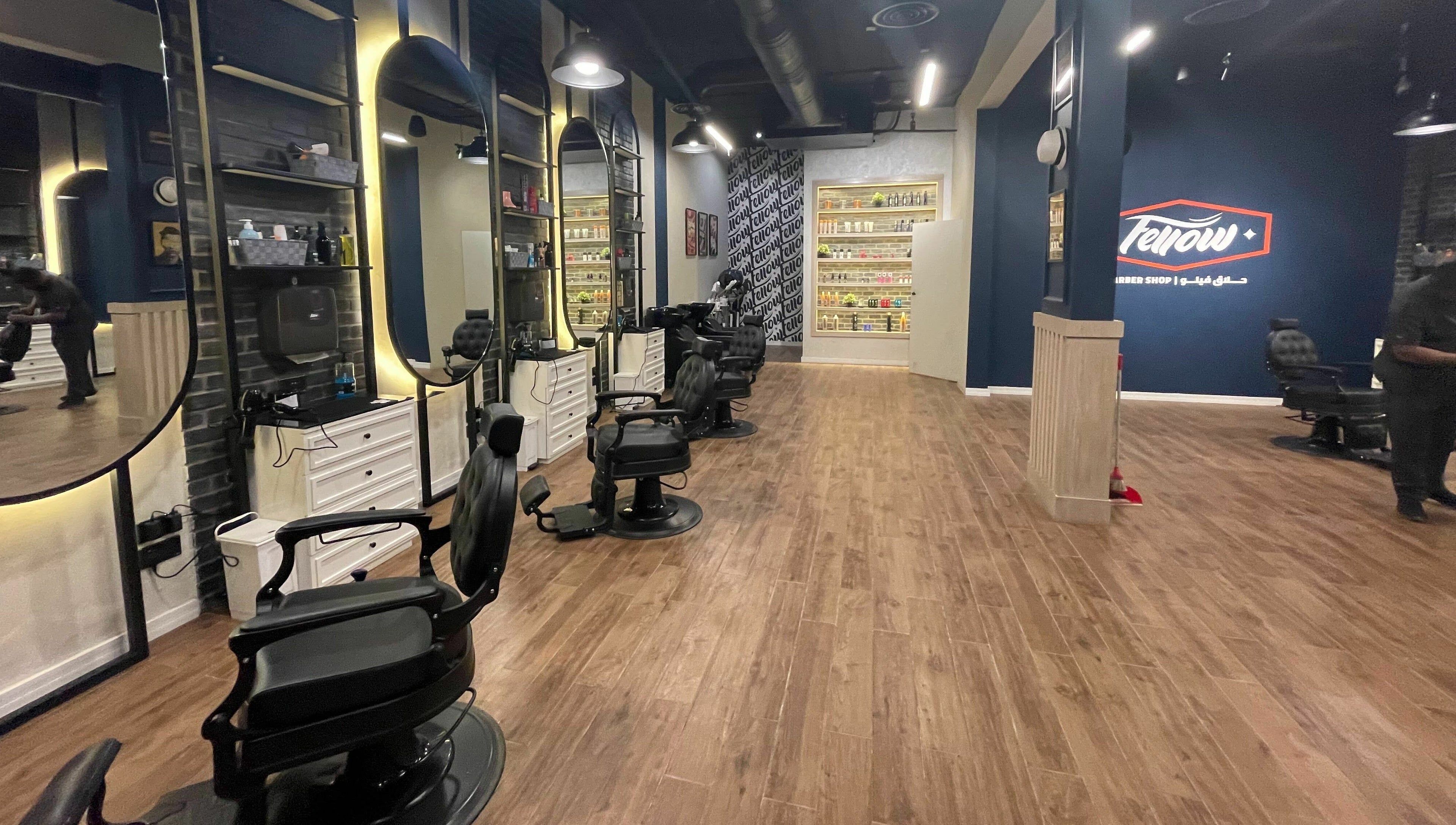 Stylish interior of Fellow | حلاق فيلو in Riyadh, Riyadh Province, SA with modern barber chairs and mirrors.