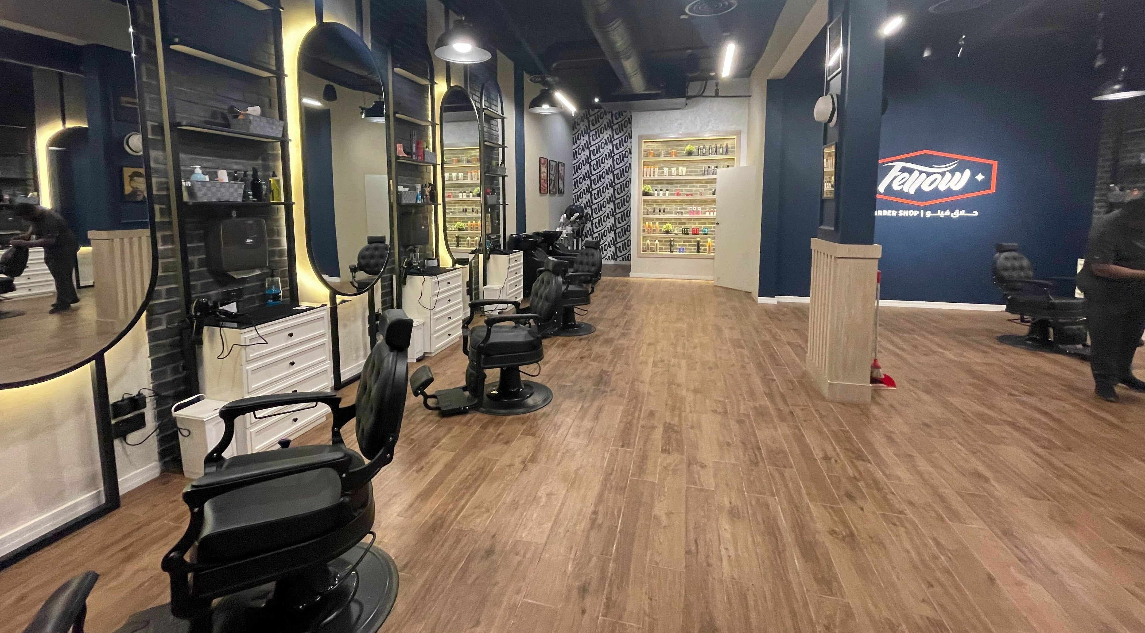 Stylish interior of Fellow | حلاق فيلو in Riyadh, Riyadh Province, SA with modern barber chairs and mirrors.