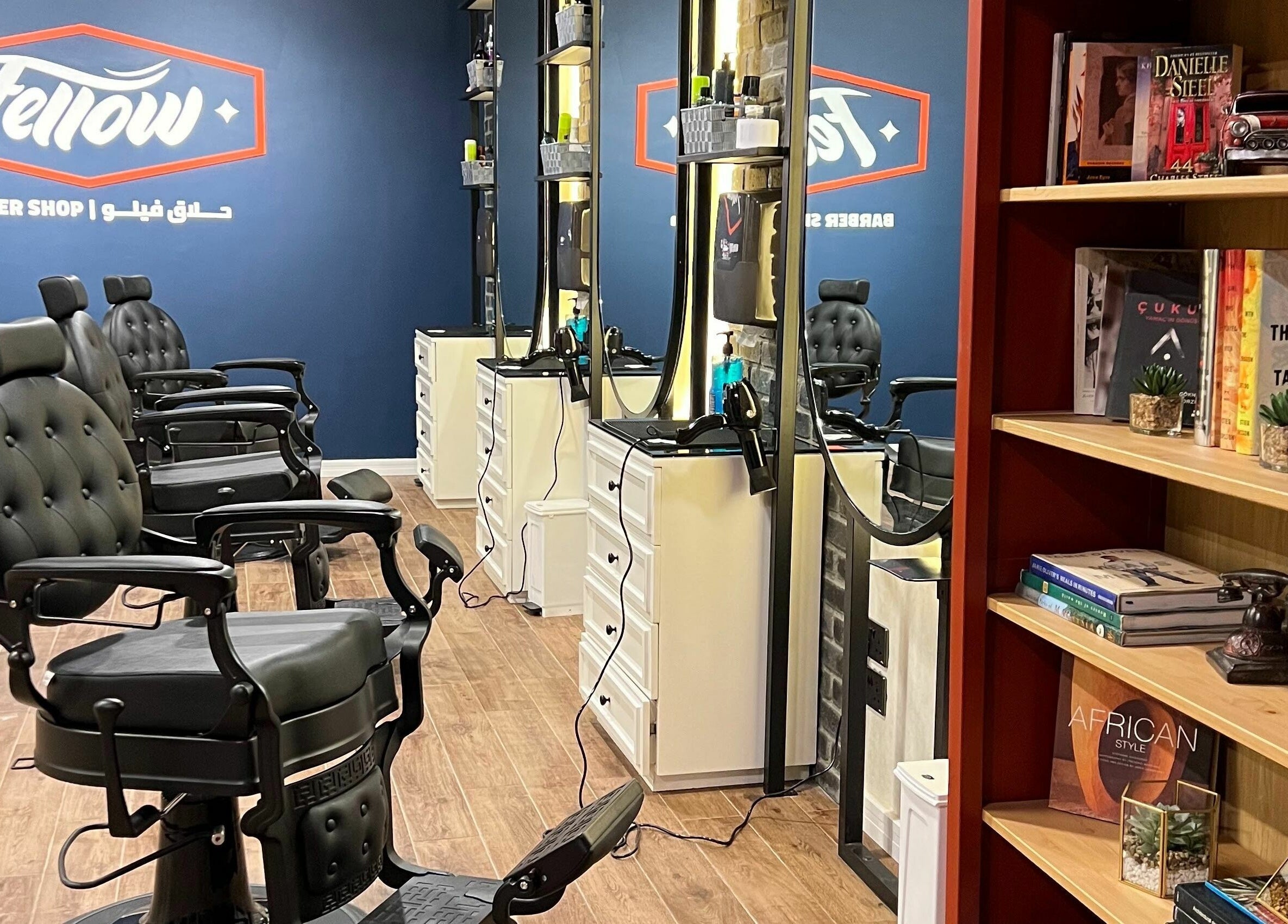 Modern barber chairs at Fellow | حلاق فيلو, Riyadh, Riyadh Province, SA, with stylish decor.