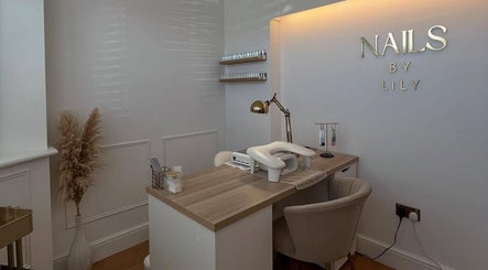 Chic nail care station at NailsByLily, Hinckley, England, GB. Elegant decor enhances relaxation.