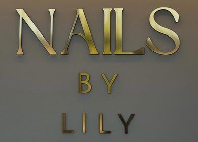Elegant gold logo of NailsByLily, Hinckley, England, GB on a sleek background.