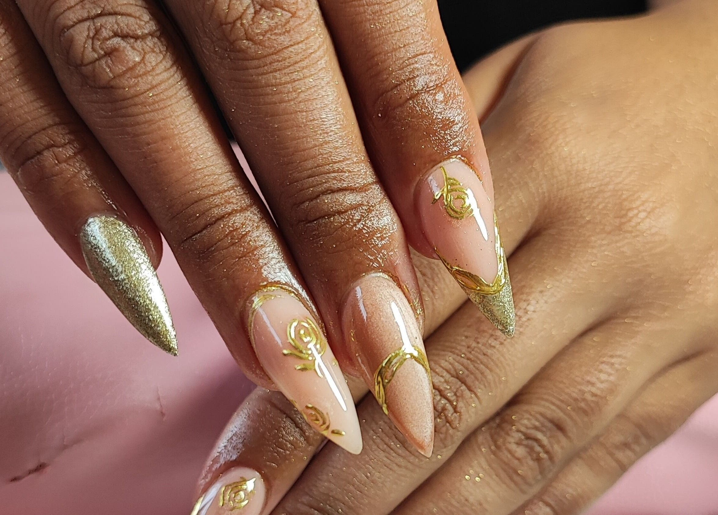 Intricate nail art with golden details at Micakayla's Nail Room, Ennerdale, Gauteng, ZA.