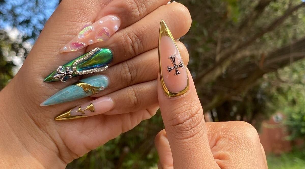 Artistic nail designs at Micakayla's Nail Room, Ennerdale, Gauteng, ZA featuring intricate embellishments.