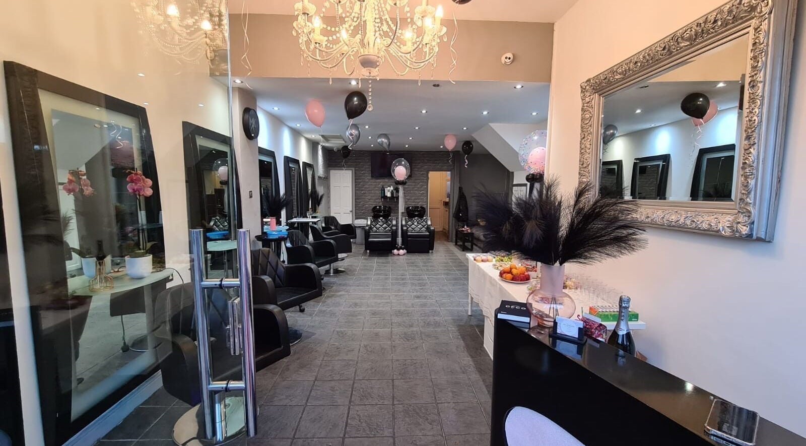 Elegant interior of MK London Beauty and Hair, London, England, GB, featuring plush chairs and luxurious decor.