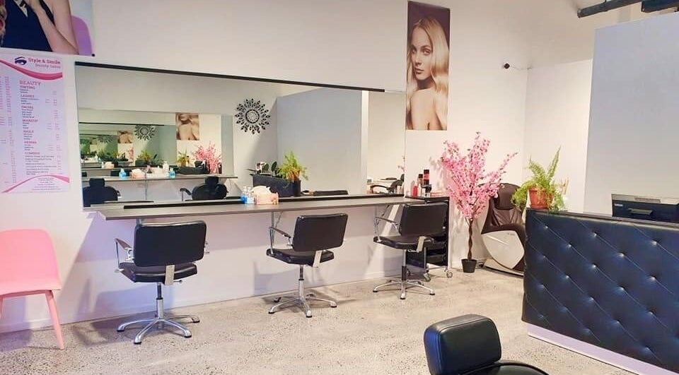 Modern salon interior at Style and Smile Beauty Parlour, Hamilton, Waikato, NZ, featuring elegant styling stations.