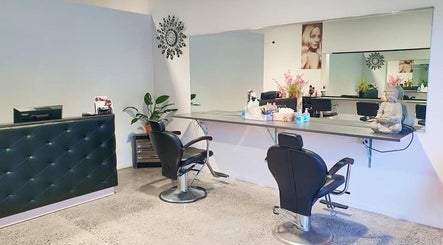 Cozy interior of Style and Smile Beauty Parlour, Hamilton, Waikato, NZ with stylish chairs and mirrors.