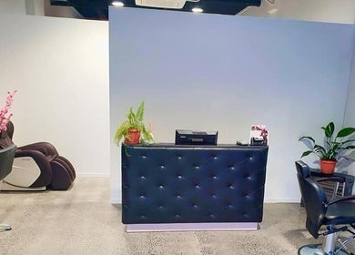 Elegant reception area at Style and Smile Beauty Parlour, Hamilton, Waikato, NZ, with stylish decor and seating.