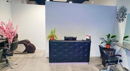 Elegant reception area at Style and Smile Beauty Parlour, Hamilton, Waikato, NZ, with stylish decor and seating.