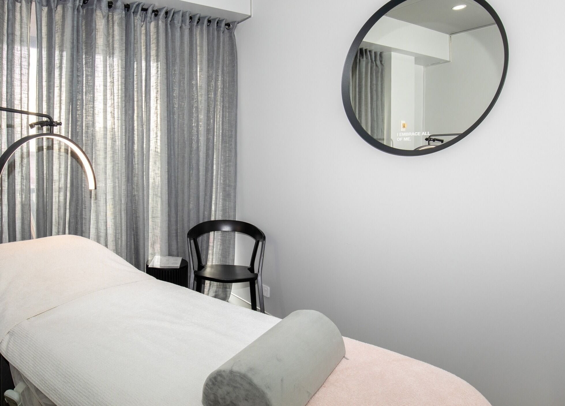 Calm treatment room at Skin at Bardon, Bardon, Queensland, AU with a massage bed and ambient lighting.
