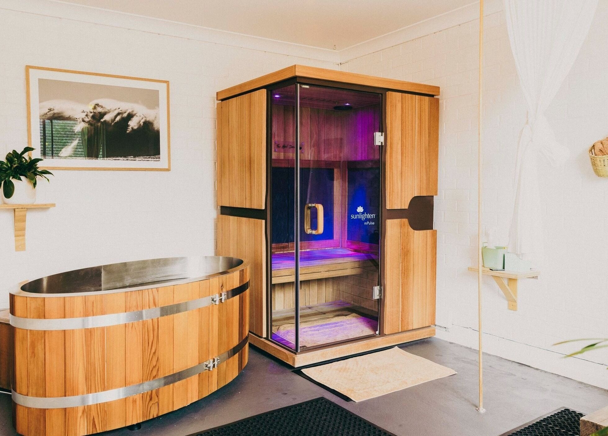 Relaxing sauna room at The Heal Zone - Avalon, Avalon Beach, New South Wales, AU with wooden design and plants.