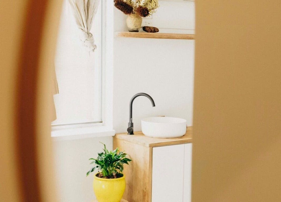 Serene vanity setup at The Heal Zone - Avalon, Avalon Beach, New South Wales, AU, featuring plant decor.