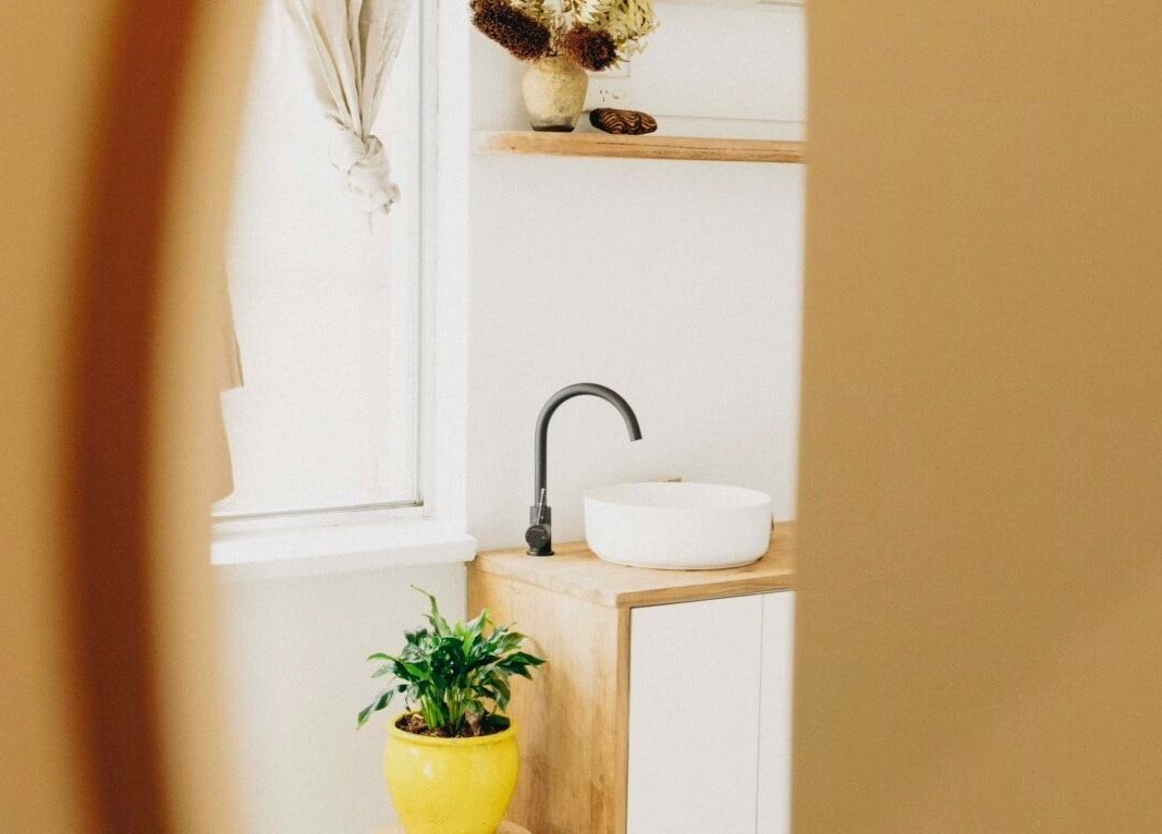Serene vanity setup at The Heal Zone - Avalon, Avalon Beach, New South Wales, AU, featuring plant decor.