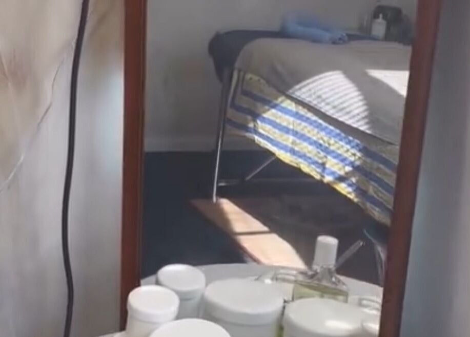 Calm treatment room at Balanz for Body in Auckland, Auckland, NZ, featuring wellness products and therapy bed.