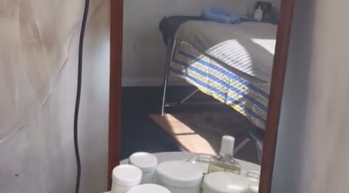 Calm treatment room at Balanz for Body in Auckland, Auckland, NZ, featuring wellness products and therapy bed.