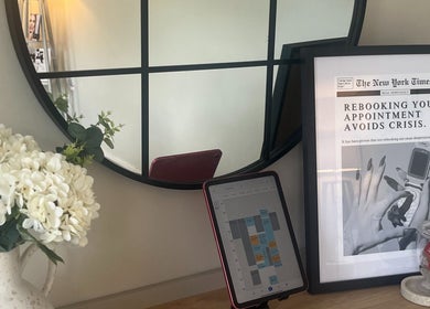 Stylish mirror and schedule display at By Amy Rose in Gainsborough, England, GB.